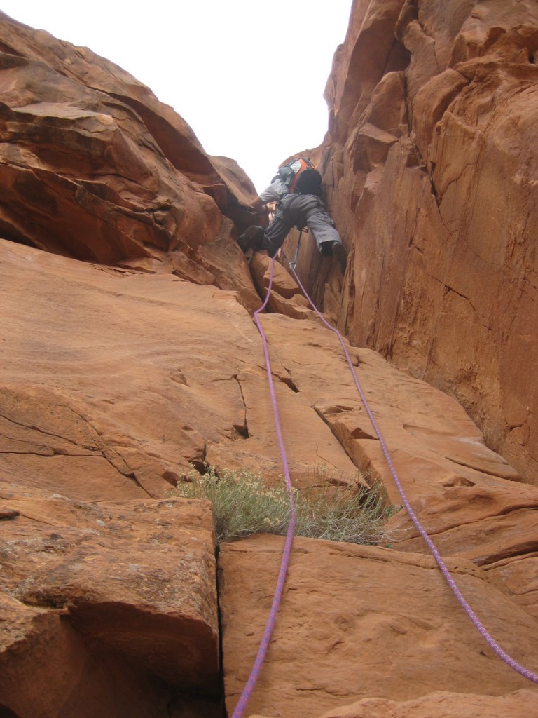 Spencer going up the 5th class section with fixed ropes.